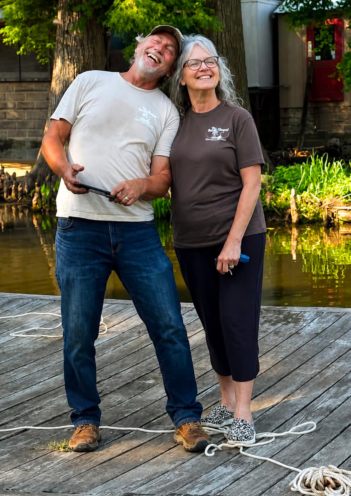 The owners of Southshore Resort on the dock at Reelfoot Lake