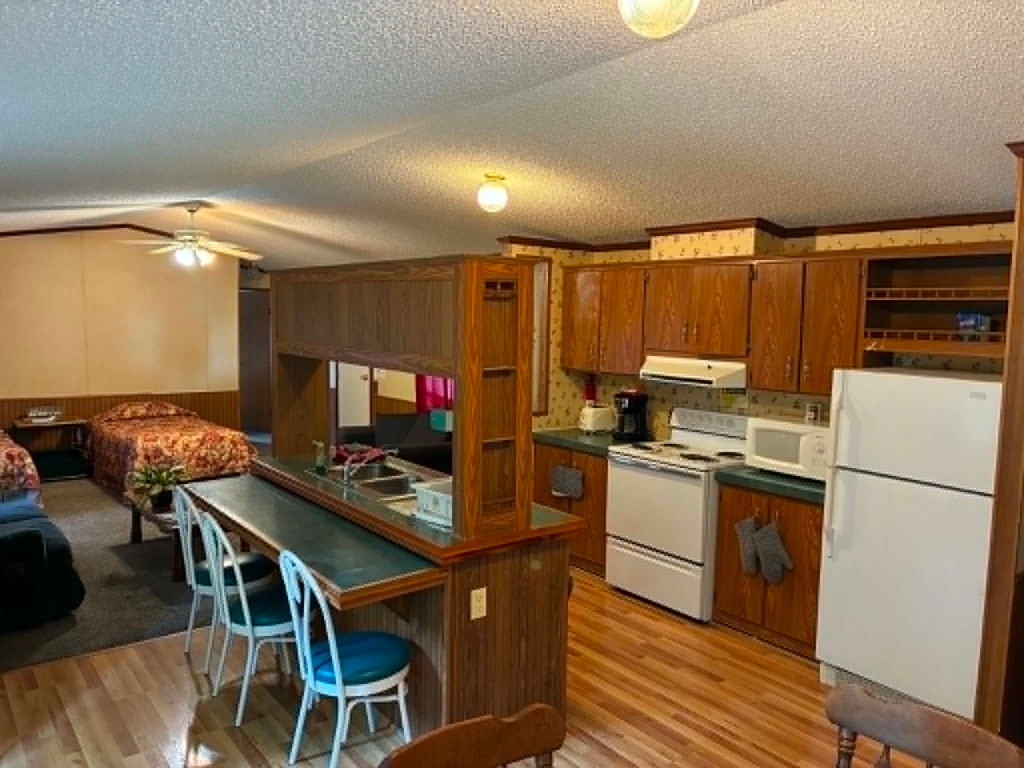 Large Group Lodging full kitchen with bar seating and living area