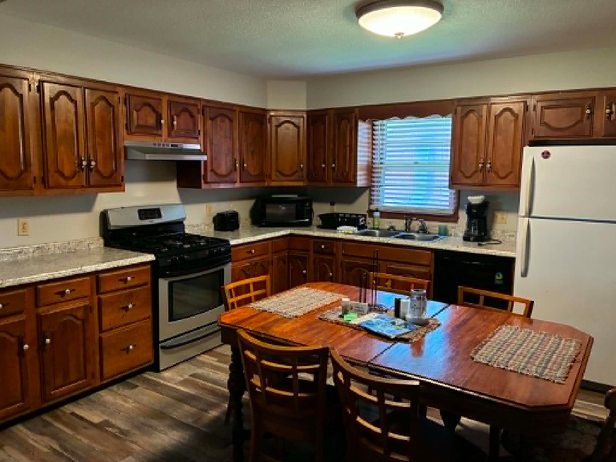 Lake House full kitchen with dining area