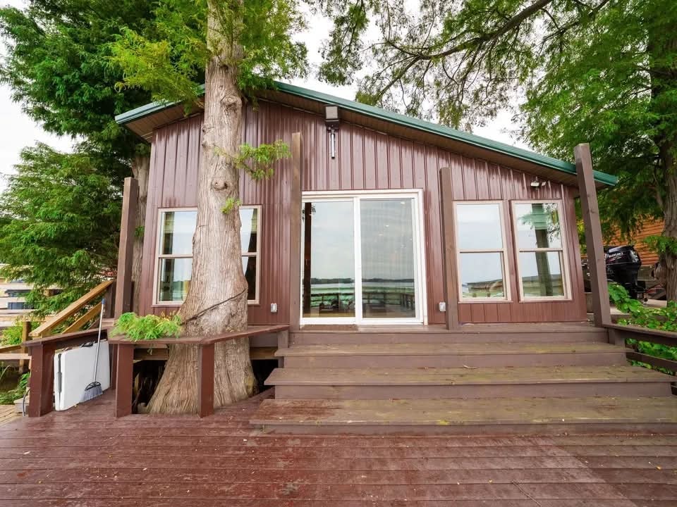 Lakeside Luxury Lodge front exterior with large windows