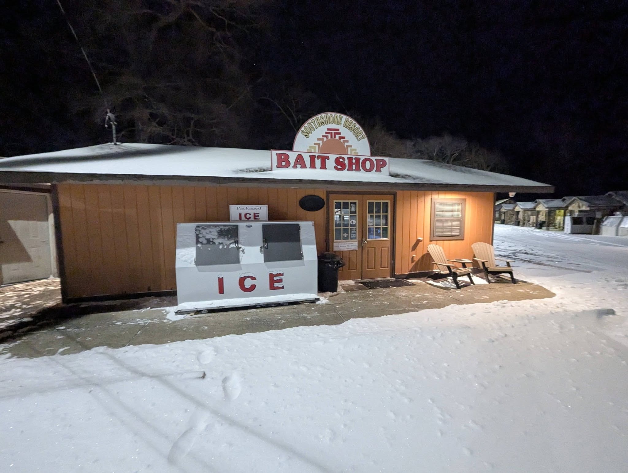 Southshore Resort Bait Shop exterior at night in the snow