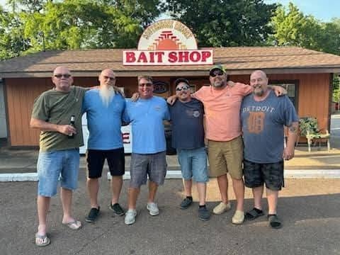 Group of guests in front of the Southshore Resort Bait Shop