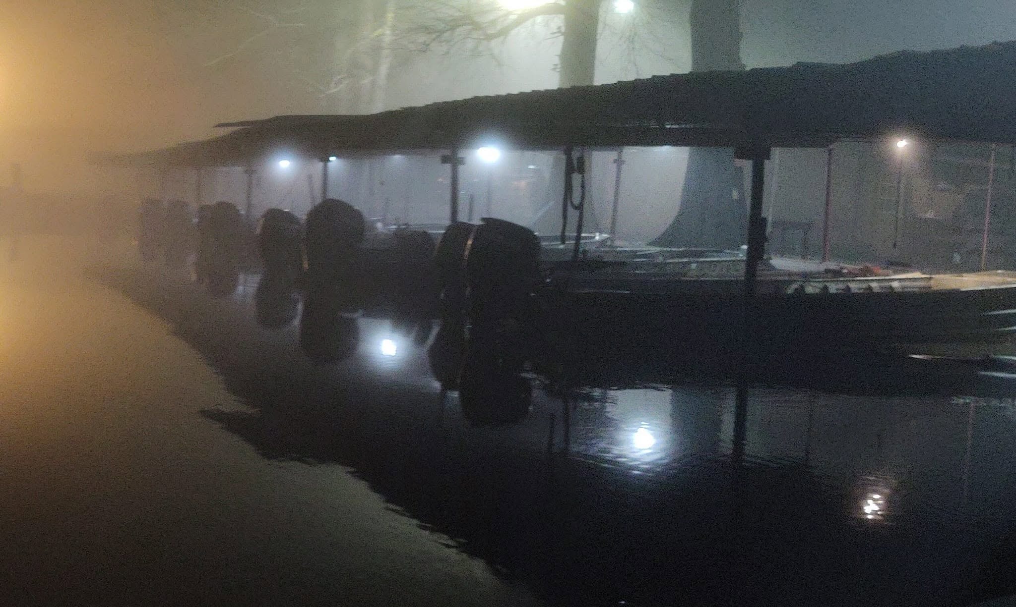 Southshore Resort boat dock glowing through early morning fog