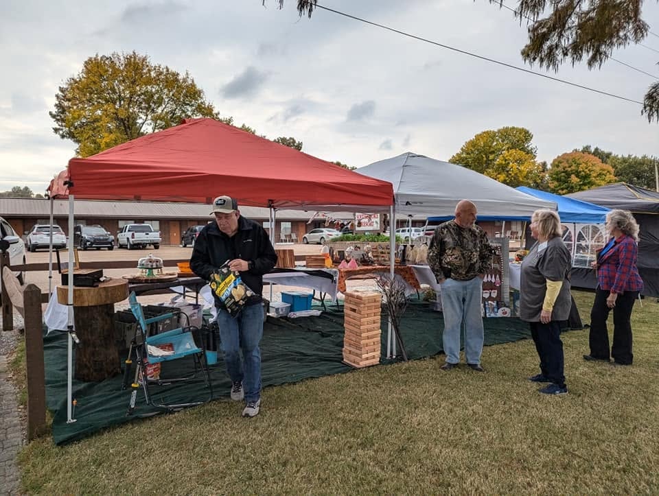 Outdoor vendor tents at the Callmakers & Collectors Festival