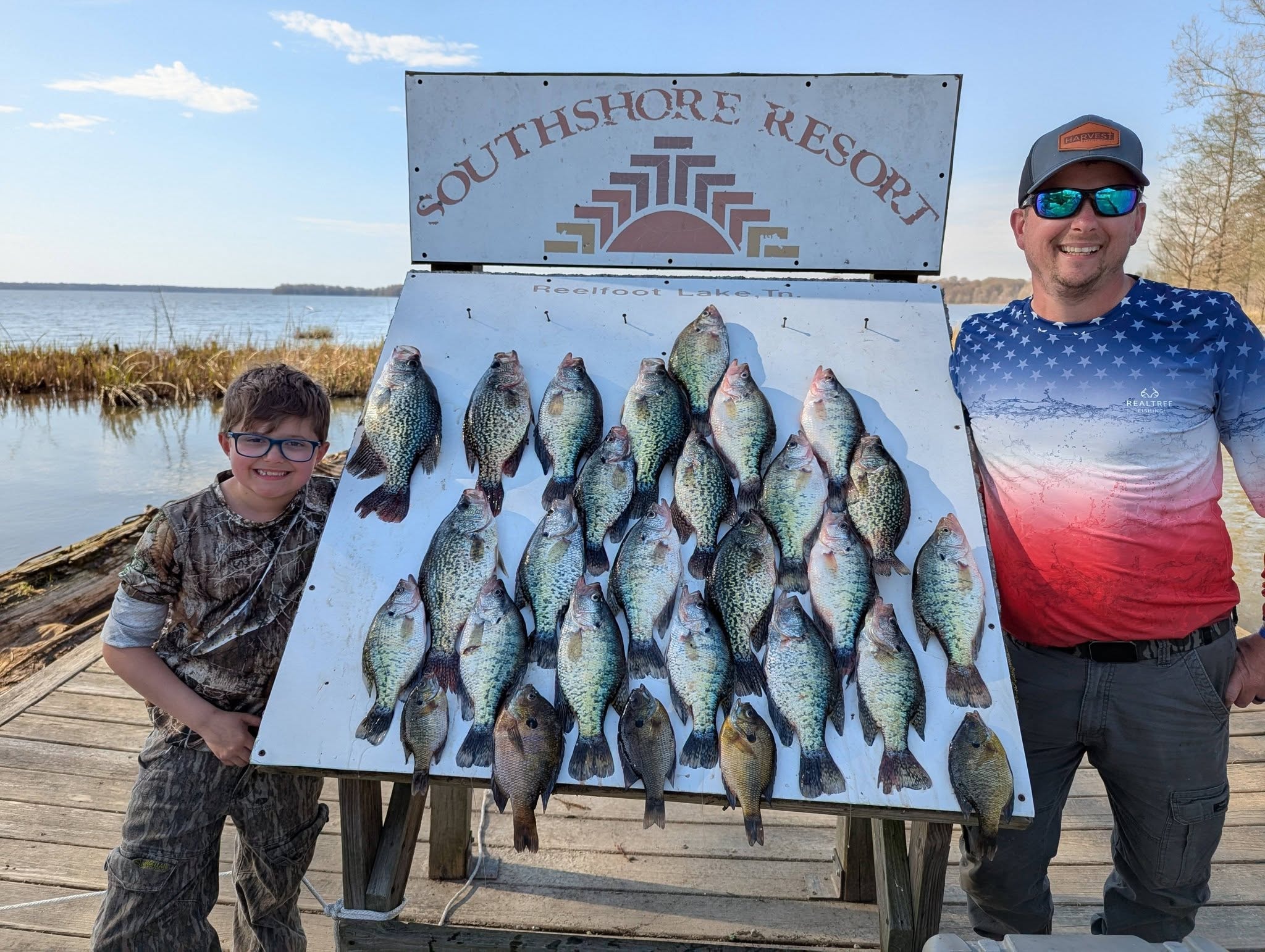 Fisherman with a fresh crappie catch on Reelfoot Lake