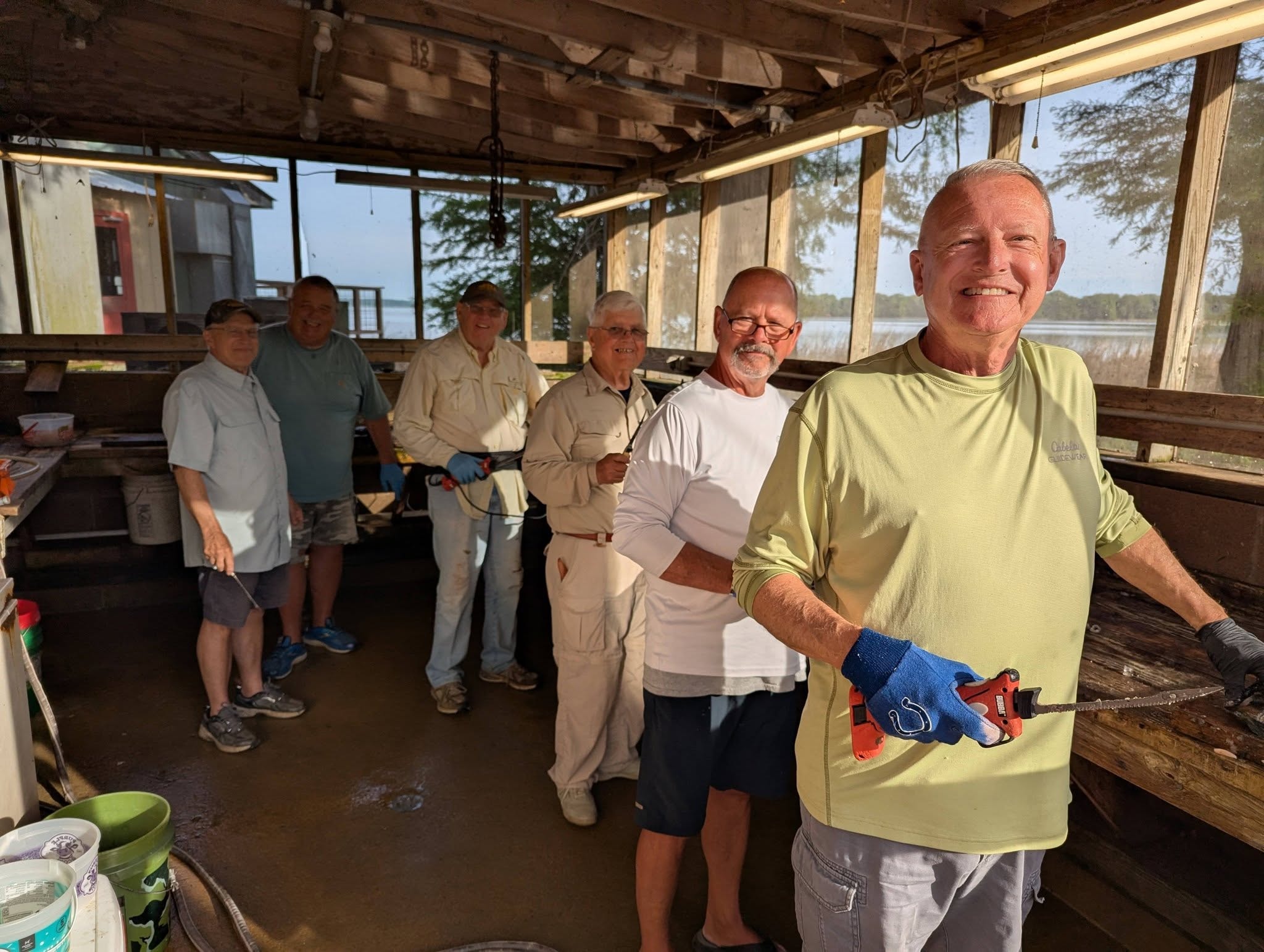 Group cleaning fish at the Southshore Resort station