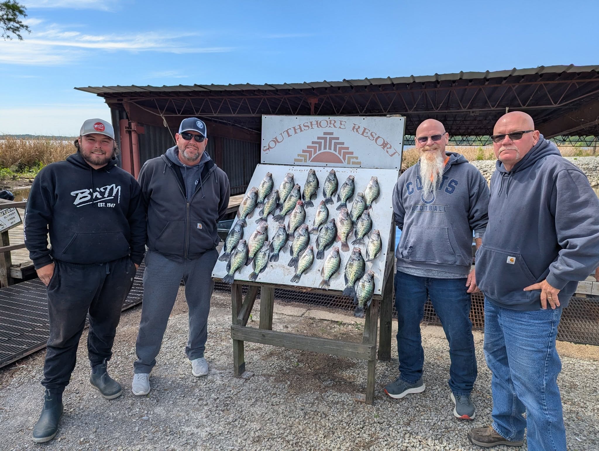 Four guests with a full crappie board at Southshore Resort