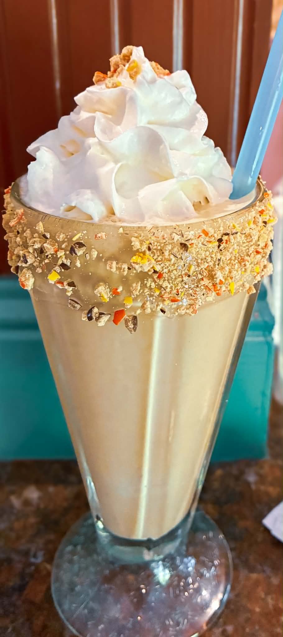 Creamy vanilla Quake Shake with candy-coated rim and whipped cream at The Boat House Restaurant
