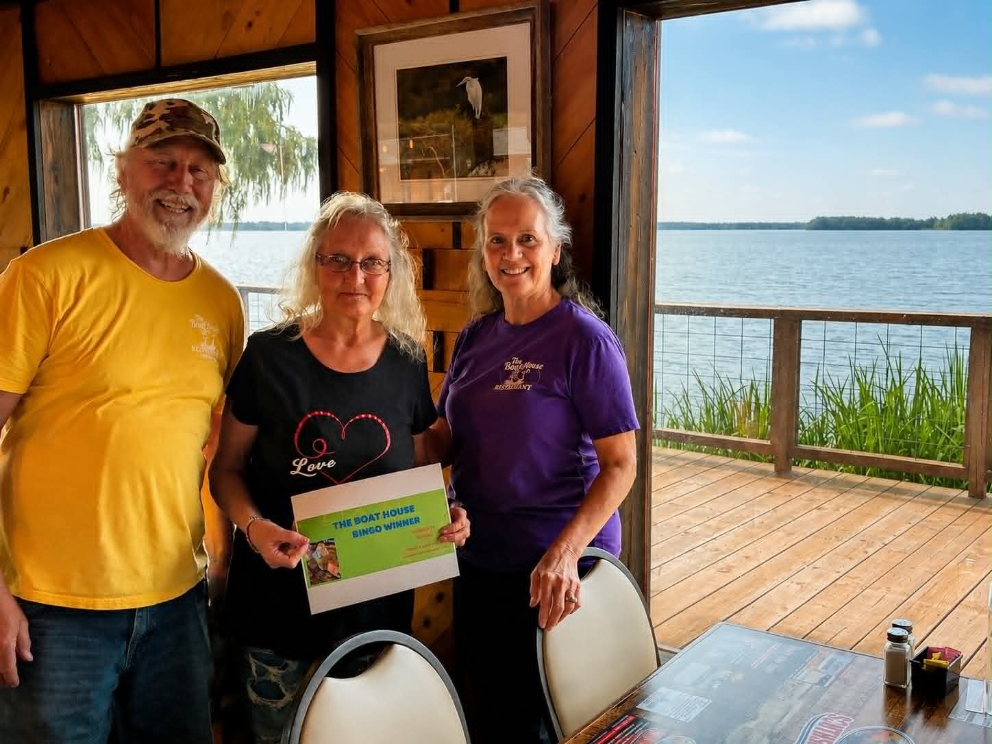 Boat House Bingo winner with friends and staff at Reelfoot Lake