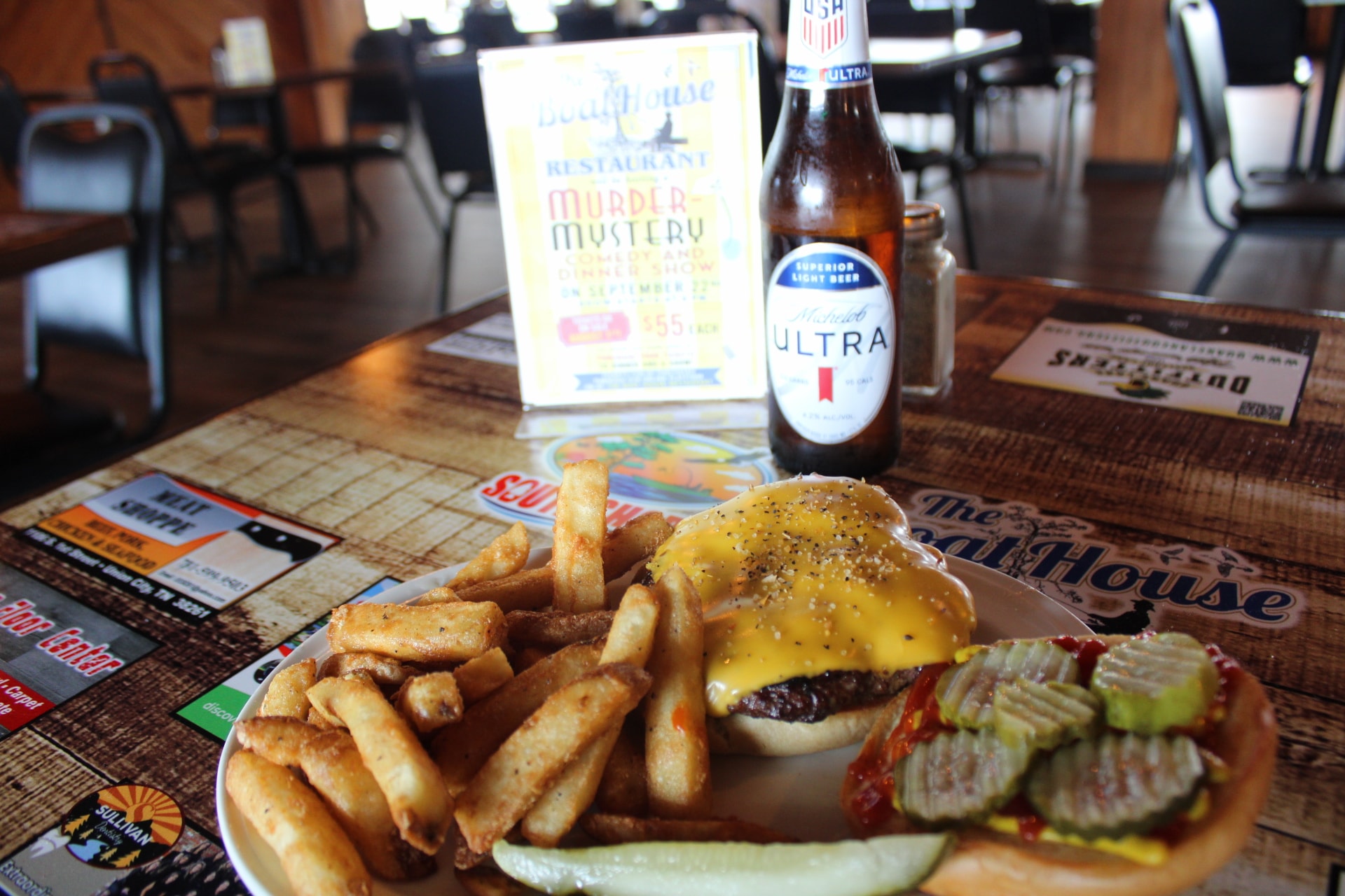 Cheeseburger, fries and Michelob Ultra at The Boat House Restaurant