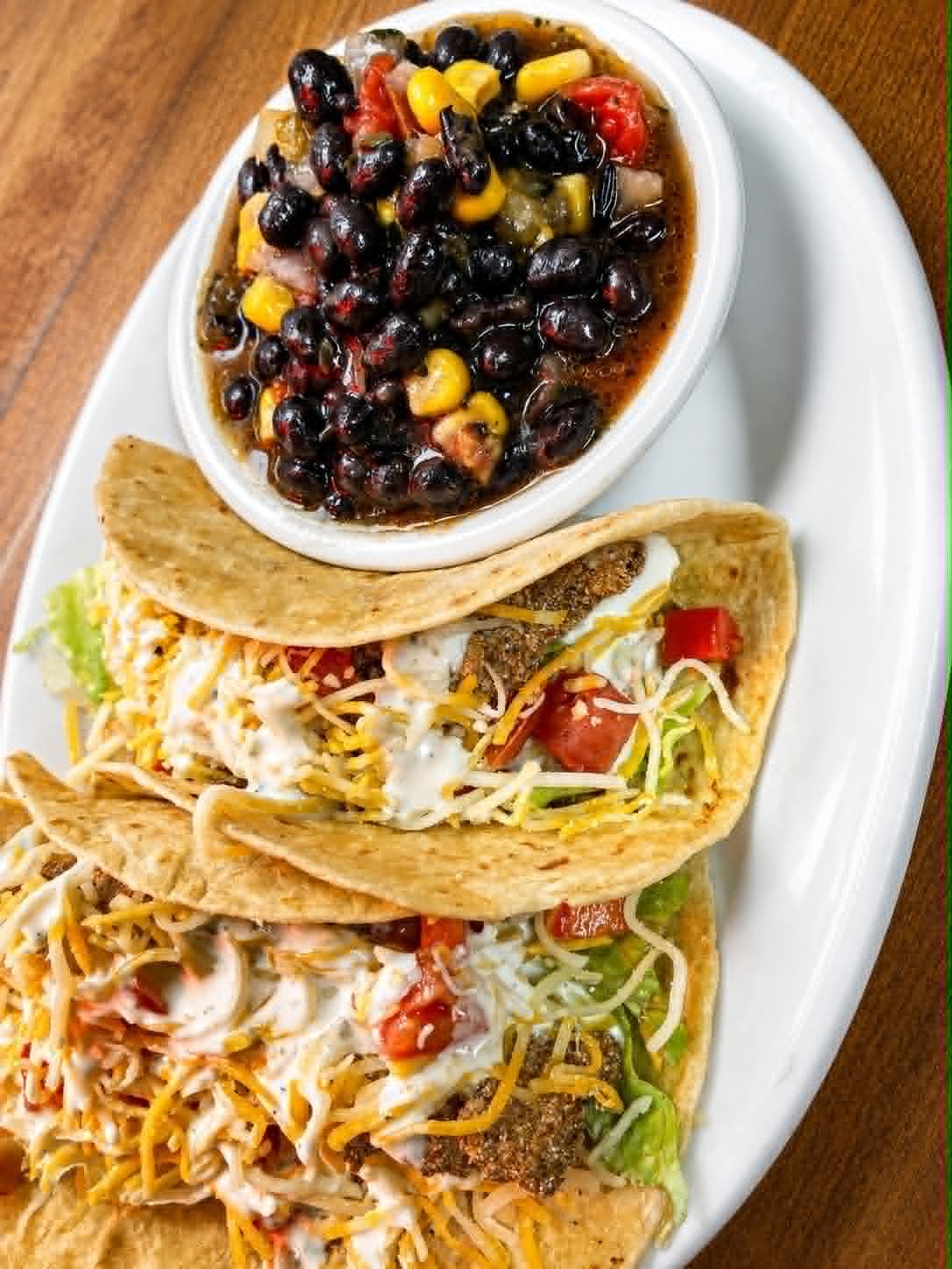 Seasoned fish tacos with black bean corn salsa at The Boat House Restaurant