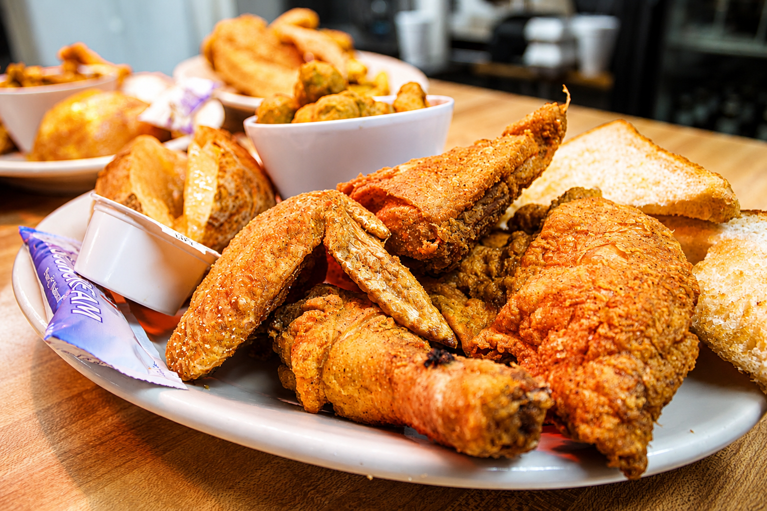 Southern fried chicken with toast and sides at The Boat House Restaurant