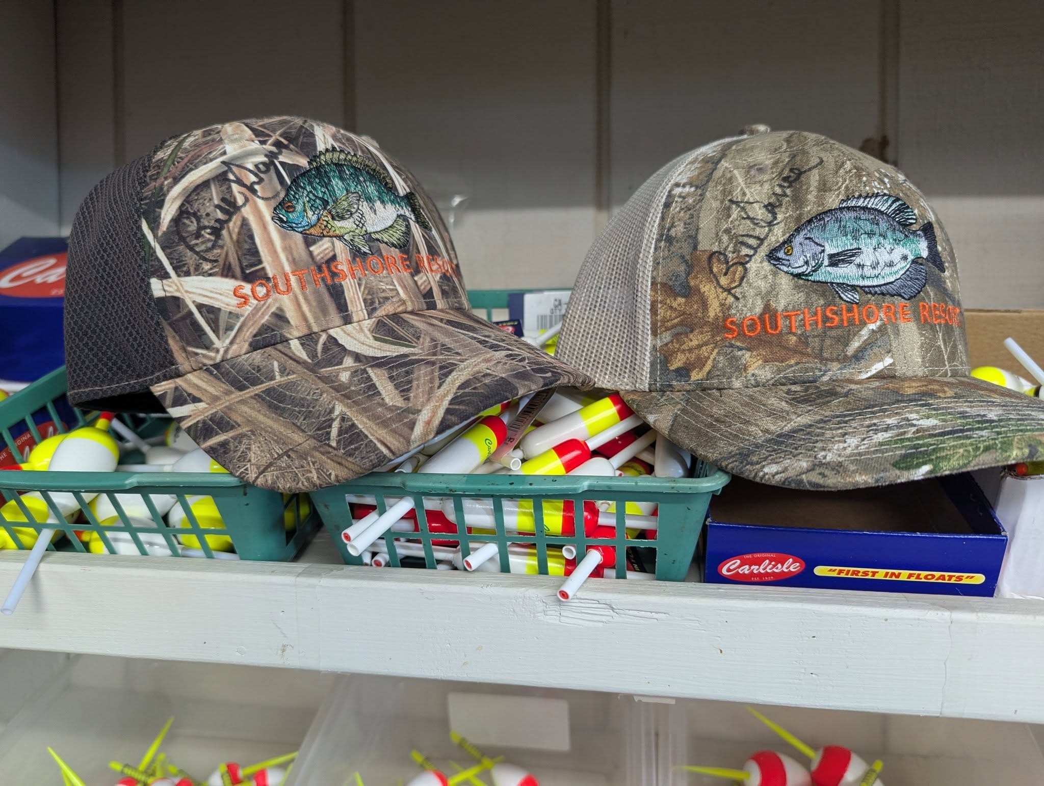 Southshore Resort camo caps and fishing floats