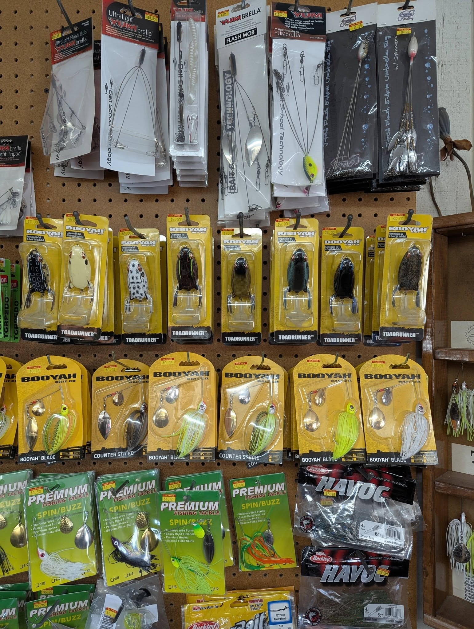Lure pegboard wall with Cotton Cordell and Heddon Torpedo lures